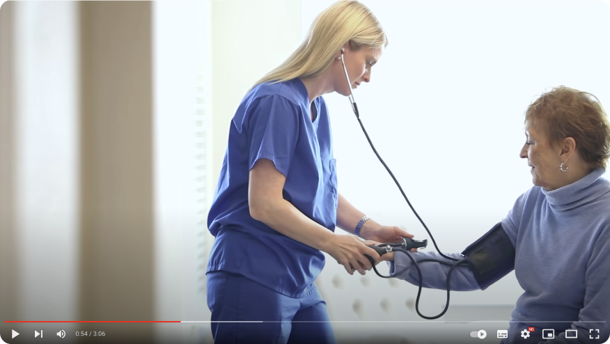 a person holding a stethoscope to a person's neck